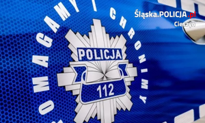 Drzwi radiowozu z logiem policja