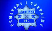 Logo policji z mottem &quot;pomagamy i chronimy&quot;