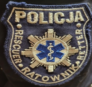 Emblemat ratownika Policja