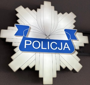 Grafika przedstawiająca odznakę policyjną